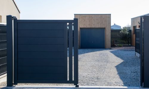 open grey double portal large metal gate high gray on suburb street house garage door